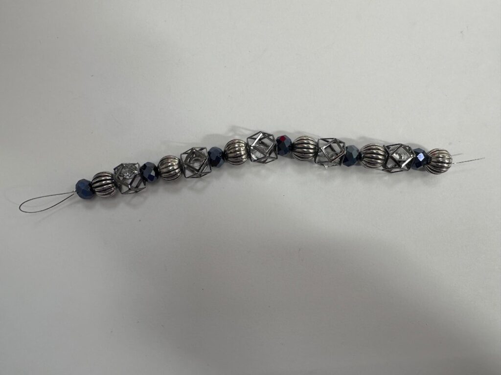 7-Inch Black and Silver Geometric Bead Strand